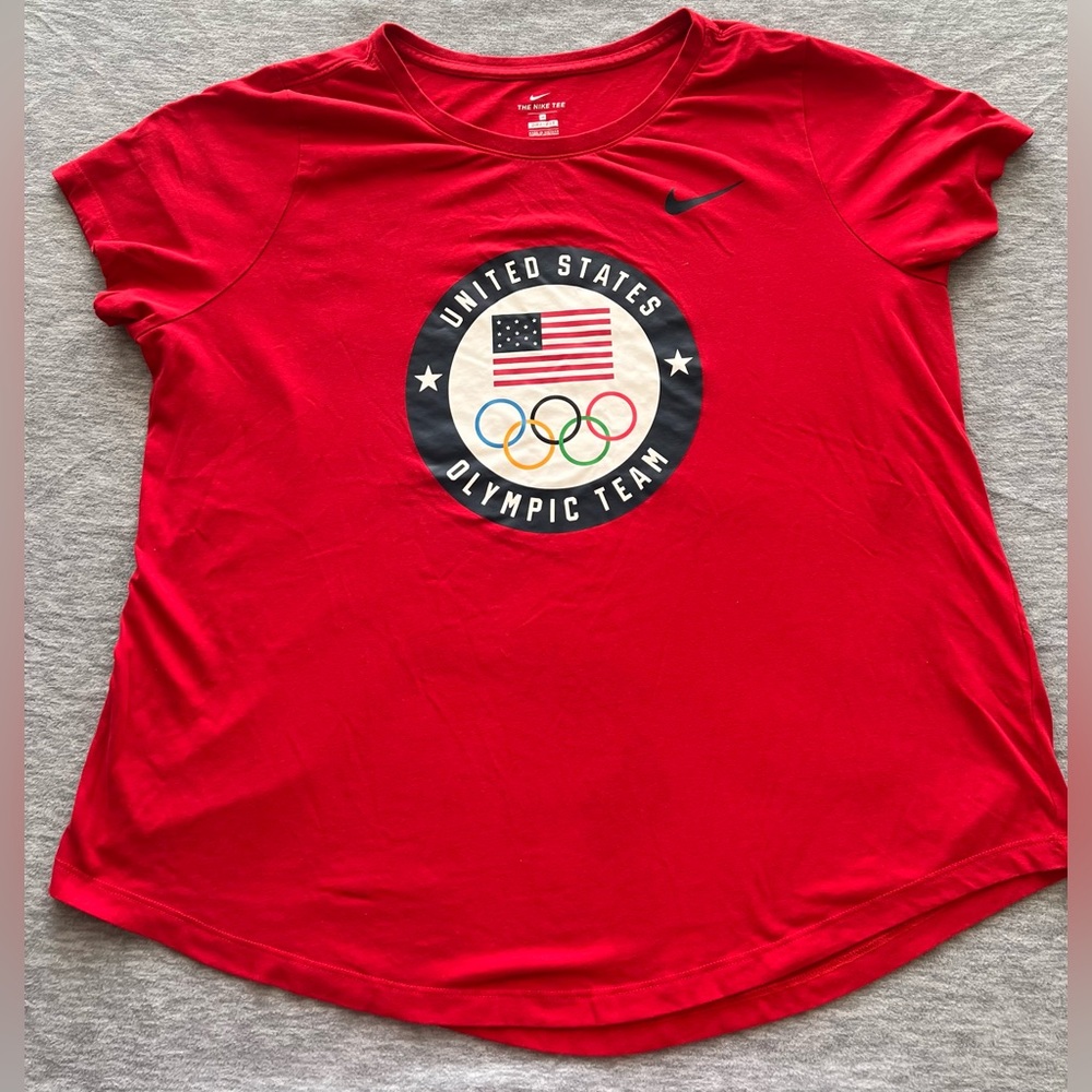 The Nike Tee Dri-Fit short sleeve top women 1X USA Olympics red graphic t-shirt